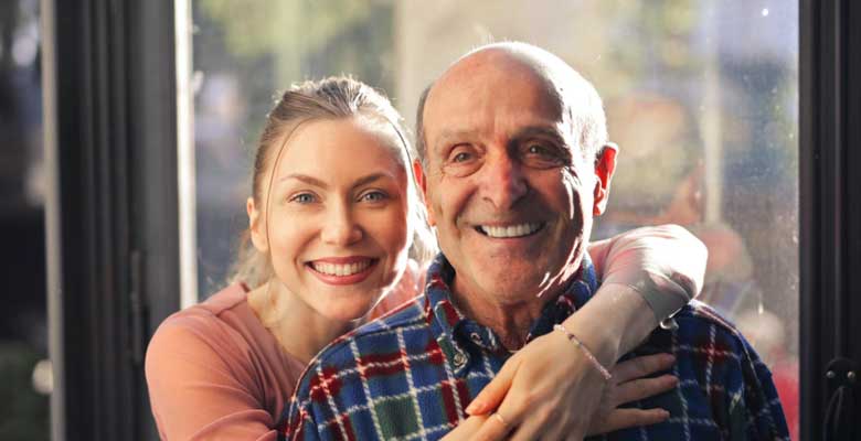 Adult child reviewing home support information